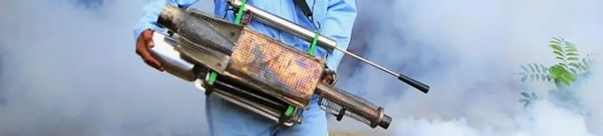 Fumigation technician using a fogger for deep pest treatment in San Jose, CA
